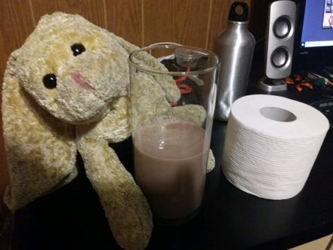 Talina with flower vase of my precious chocolate milk.jpg